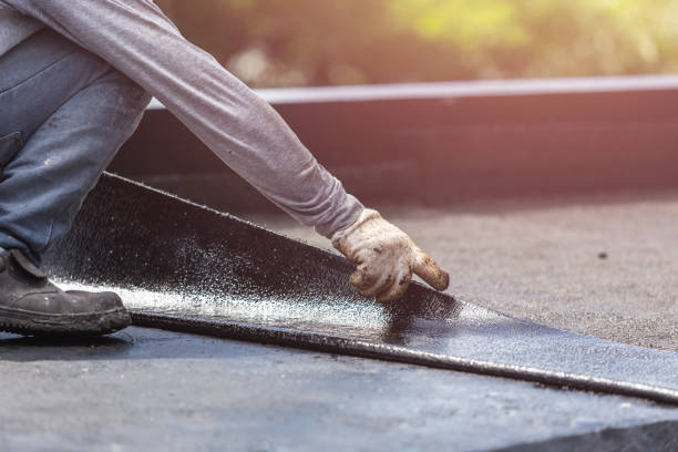 Professional Basement Waterproofing technician working in Greenvale, NY
